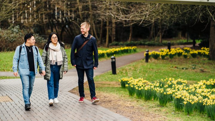 Three people walking 